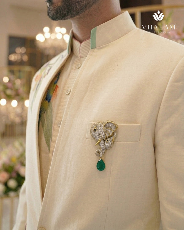 Gold Elephant Brooch With Emerald Green Stone