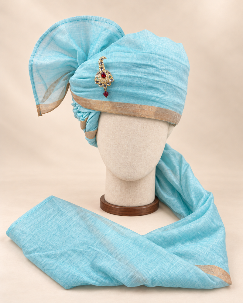 Front view of aqua gold border premium barati safa showing the gold-tone border and broad fan