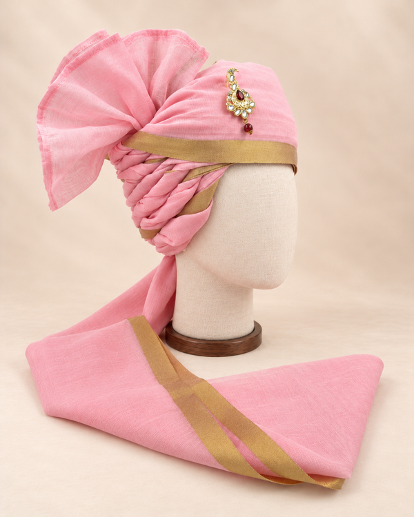 Right side view of baby pink gold border premium barati safa showing twisted folds and fan detail