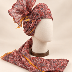 Right side view of blush pink paisley Barati Safa showing twisted folds and fan