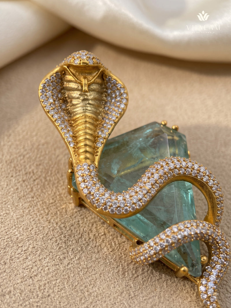 Gold-Tone Cobra Brooch with Pastel Green Accent, detail view