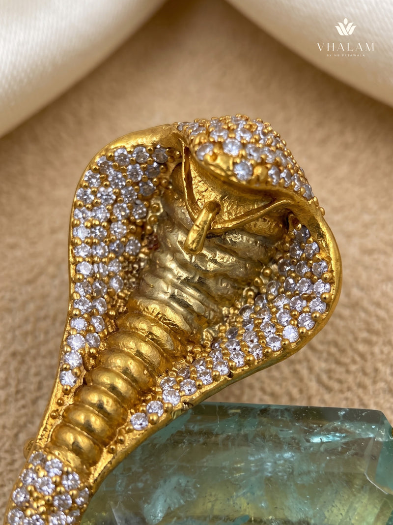 Gold-Tone Cobra Brooch with Pastel Green Accent, detail view