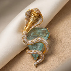 Gold-Tone Cobra Brooch with Pastel Green Accent, front view