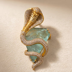 Gold-Tone Cobra Brooch with Pastel Green Accent, front view