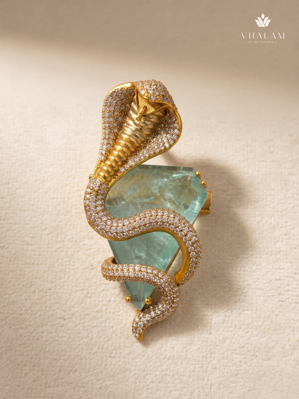 Gold-Tone Cobra Brooch with Pastel Green Accent, front view