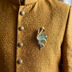 Gold-Tone Cobra Brooch with Pastel Green Accent, styled view