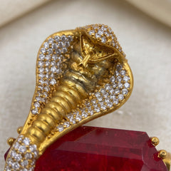 Gold-Tone Cobra Brooch with Red Accent, detail view