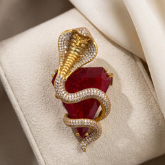 Gold-Tone Cobra Brooch with Red Accent, front view