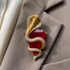 Gold-Tone Cobra Brooch with Red Accent, front view