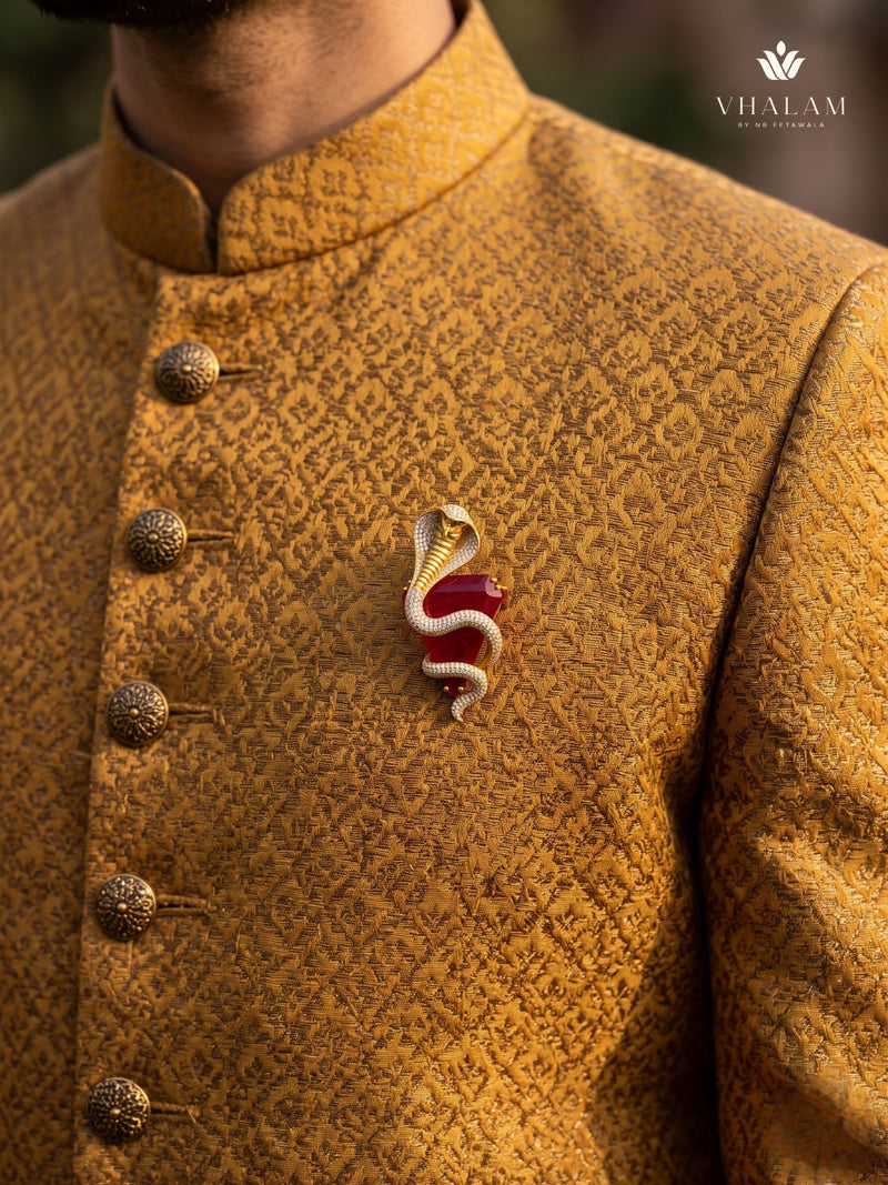 Gold-Tone Cobra Brooch with Red Accent, styled view