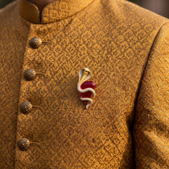 Gold-Tone Cobra Brooch with Red Accent, styled view
