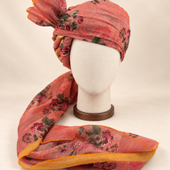 Front view of coral rose floral print Barati Safa with pink and maroon roses, olive leaves and mustard border