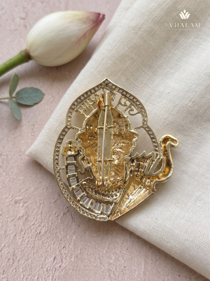 Devotional Face Brooch with Trident Motif, rear view