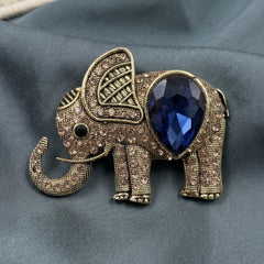 Gold-Tone Blue Elephant Brooch, front view