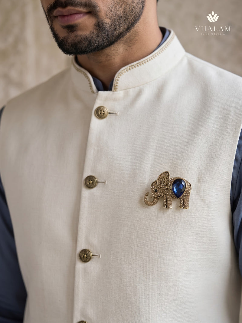 Gold-Tone Blue Elephant Brooch, styled view