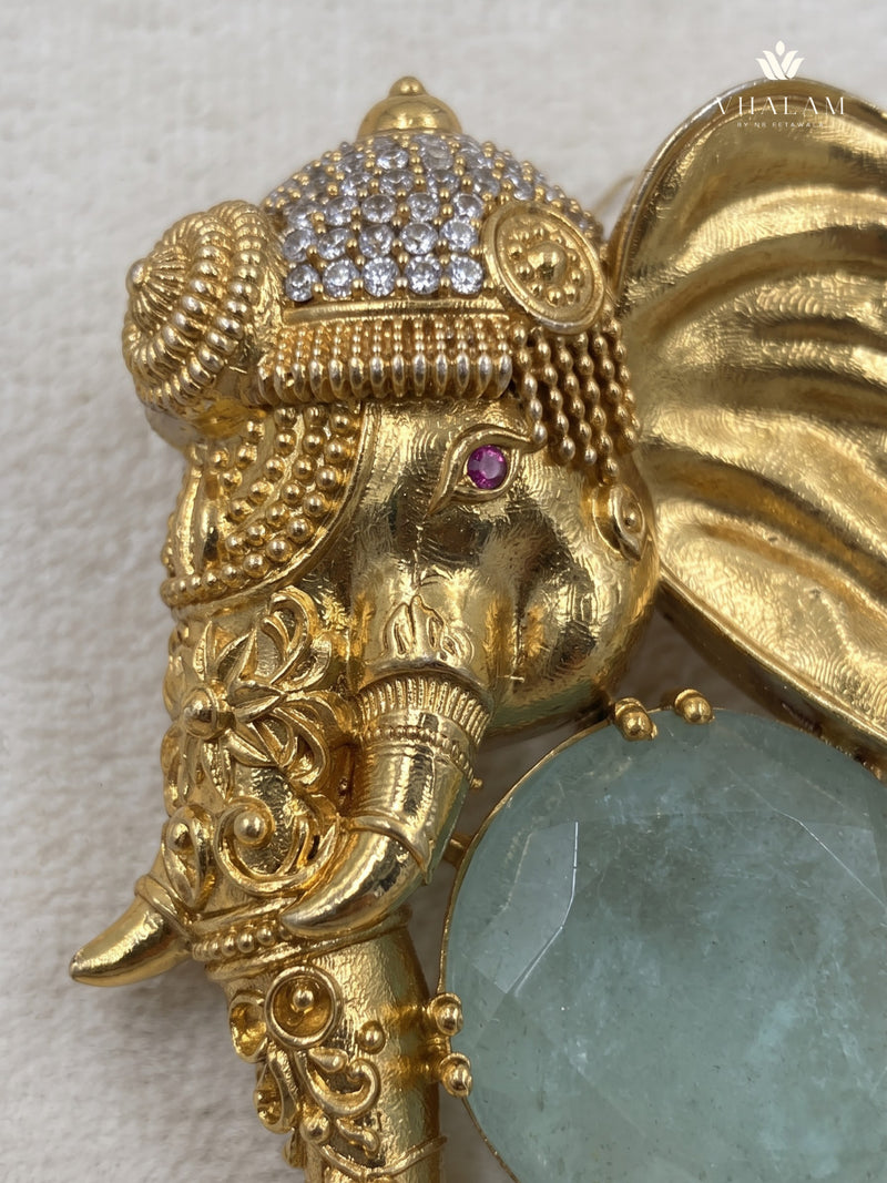 Gold-Tone Elephant Head Brooch with Pastel Green Accent, detail view