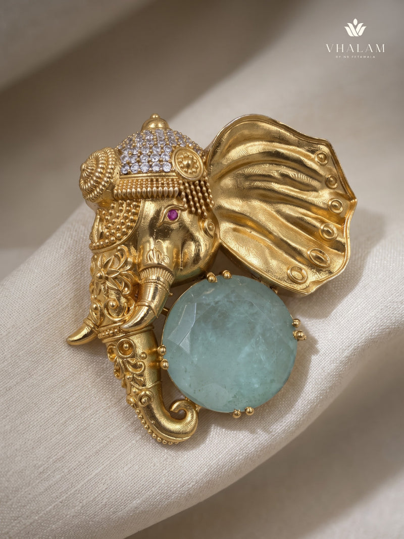 Gold-Tone Elephant Head Brooch with Pastel Green Accent, front view