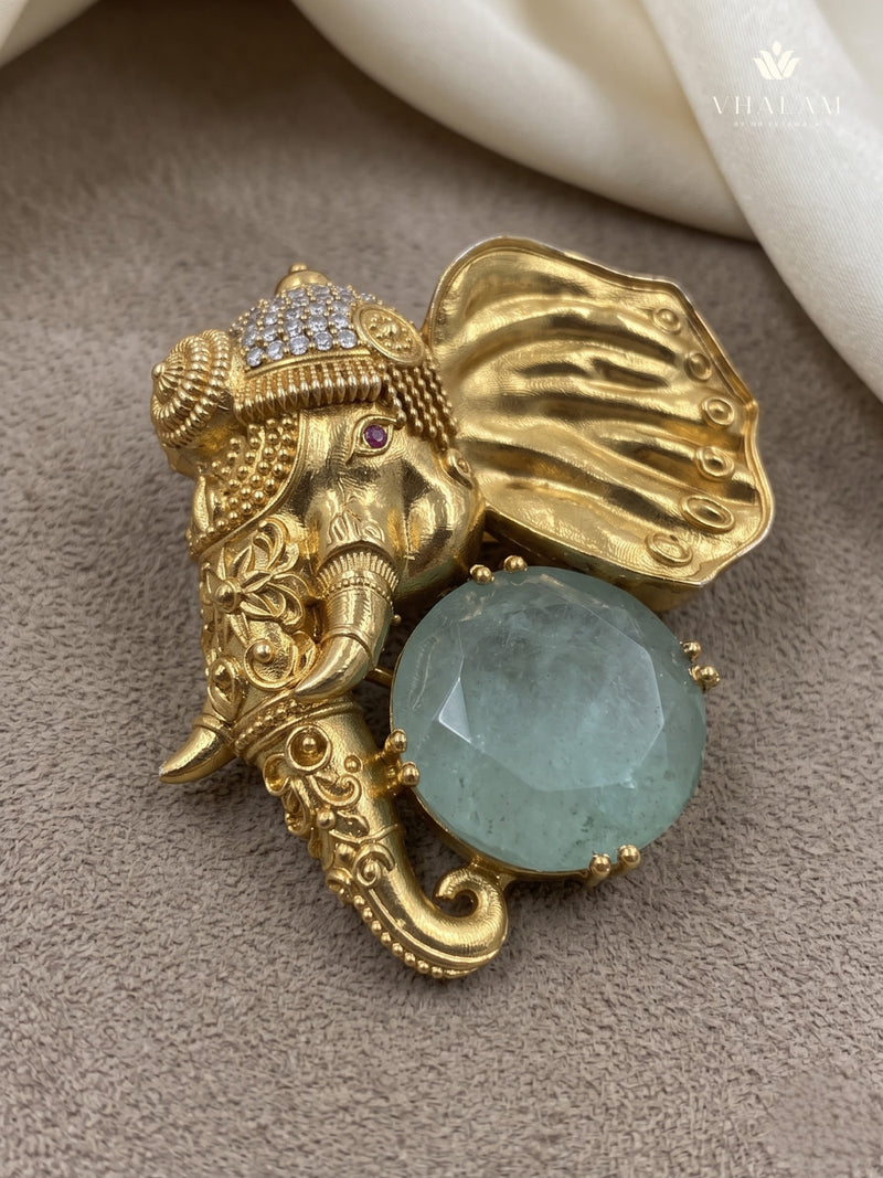 Gold-Tone Elephant Head Brooch with Pastel Green Accent, front view