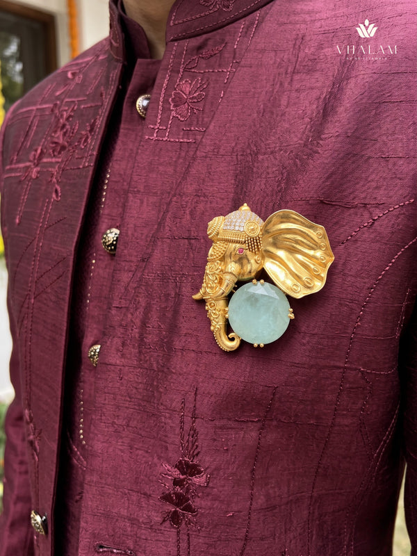 Gold-Tone Elephant Head Brooch with Pastel Green Accent, styled view