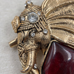 Gold-Tone Elephant Head Brooch with Red Accent, detail view