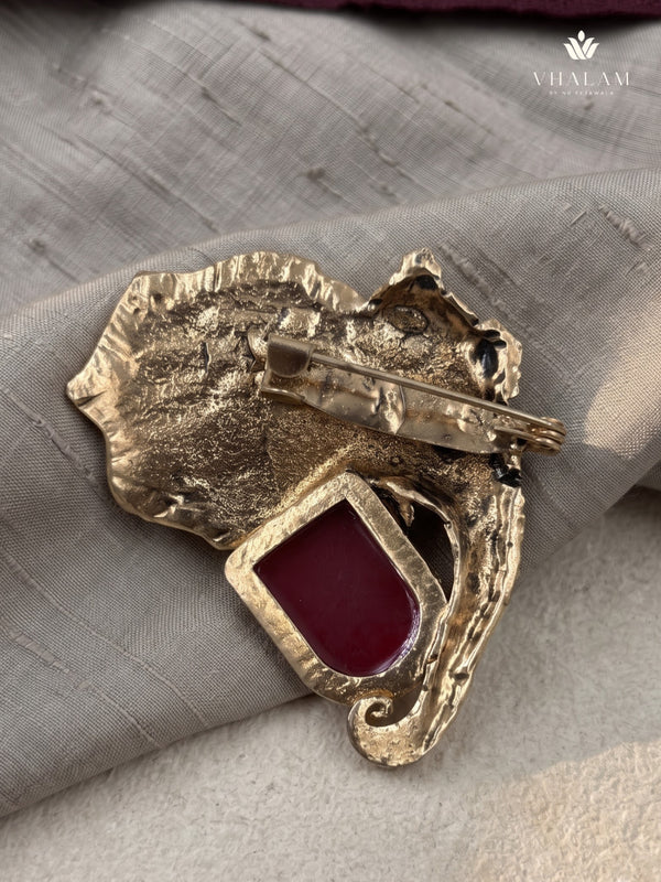 Gold-Tone Elephant Head Brooch with Red Accent, rear view