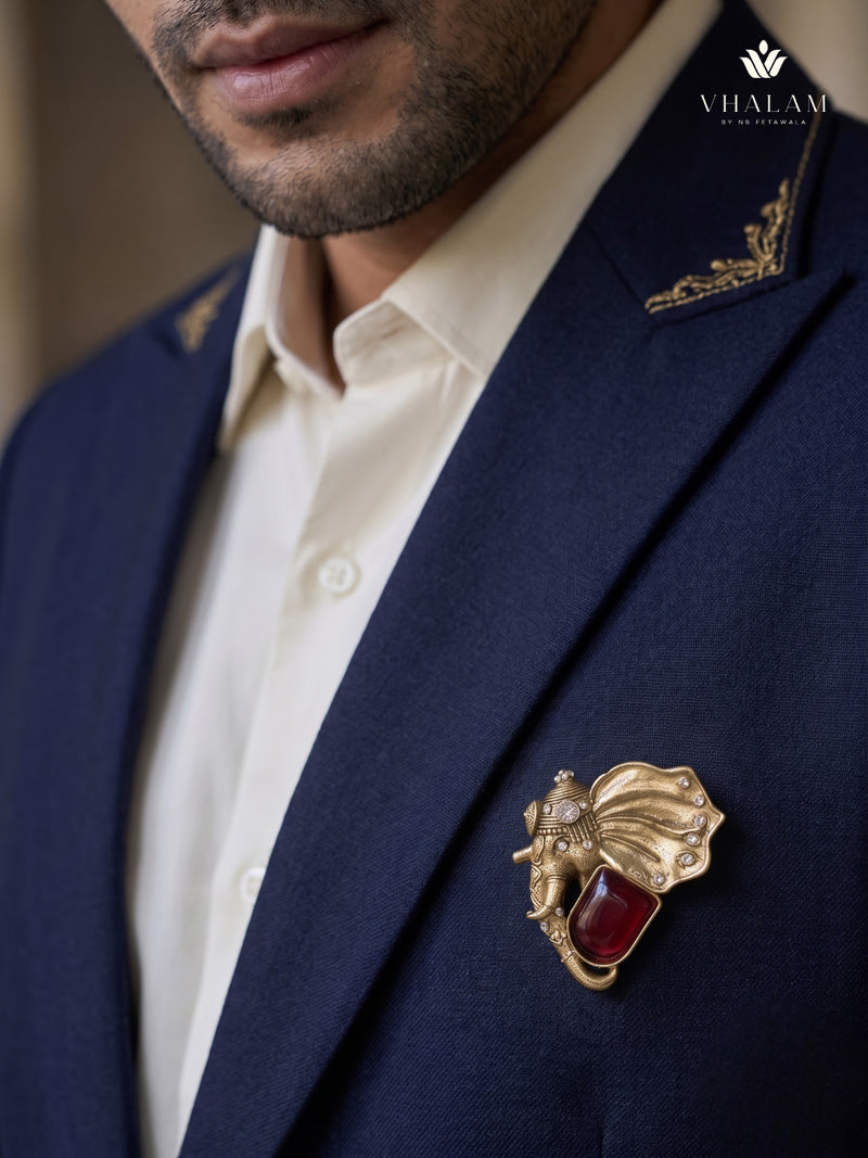 Gold-Tone Elephant Head Brooch with Red Accent, styled view