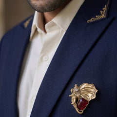 Gold-Tone Elephant Head Brooch with Red Accent, styled view