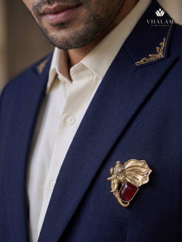 Gold-Tone Elephant Head Brooch with Red Accent, styled view