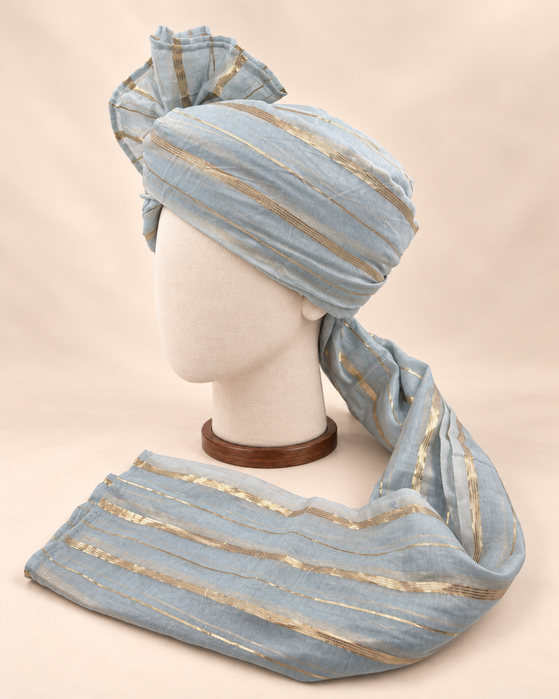 Left side view of grey gold stripe premium barati safa showing the striped wrap and long tail