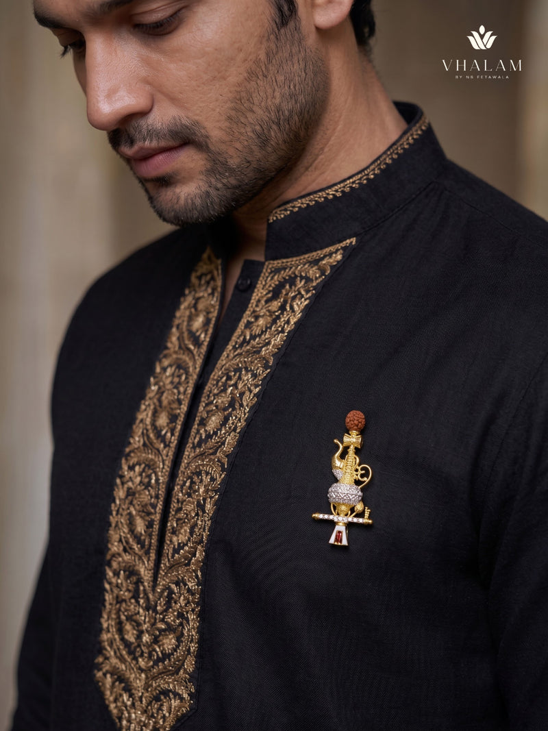 Gold-Tone Gada Motif Brooch with Red Accent, styled view