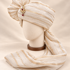 Left side view of ivory fine gold stripe premium barati safa showing the striped wrap and long tail