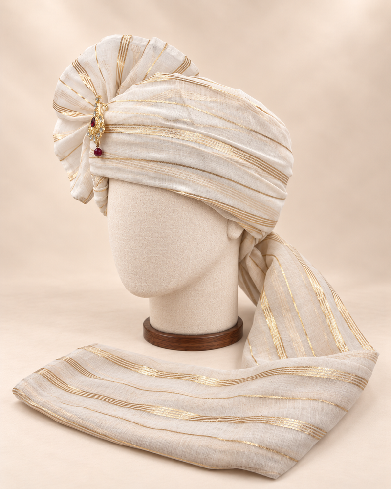 Left side view of ivory gold stripe premium Barati Safa showing the smooth striped wrap and long tail
