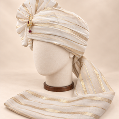 Left side view of ivory gold stripe premium Barati Safa showing the smooth striped wrap and long tail