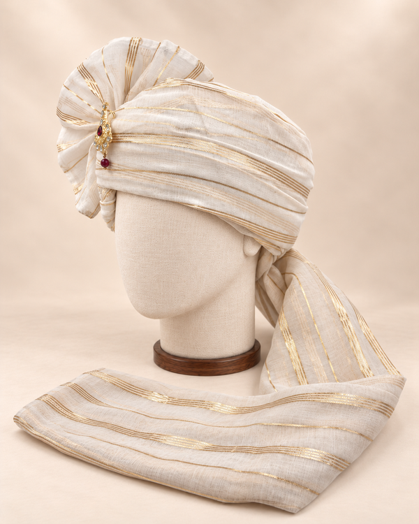 Left side view of ivory gold stripe premium Barati Safa showing the smooth striped wrap and long tail