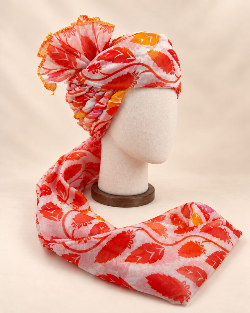 Right side view of ivory red leaf print barati safa showing twisted folds and fan detail