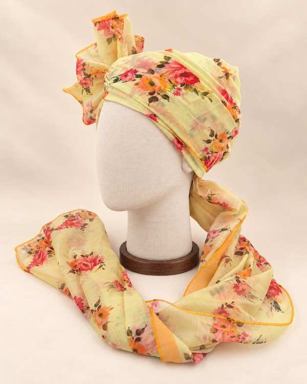 Left side view of lemon yellow floral Barati Safa showing its wrap and floral tail