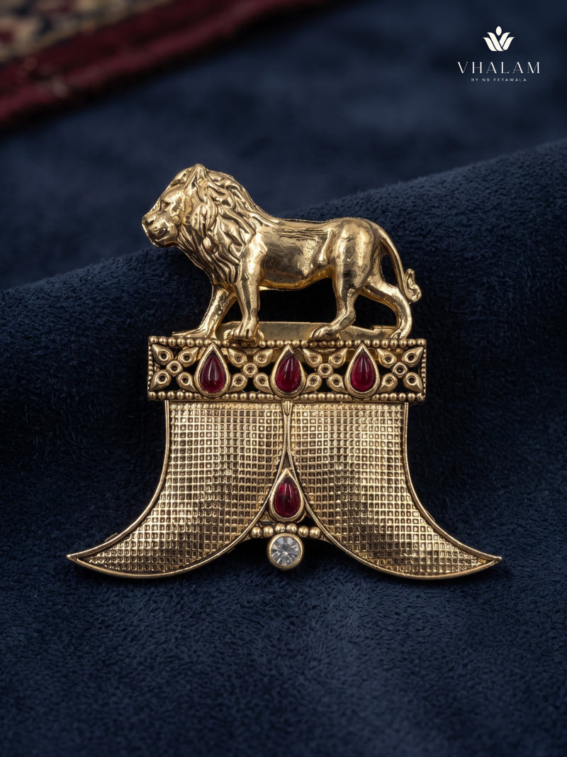 Gold-Tone Lion Crest Brooch with Red Accents, front view