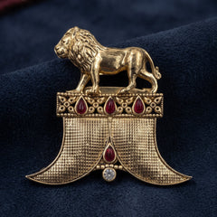 Gold-Tone Lion Crest Brooch with Red Accents, front view