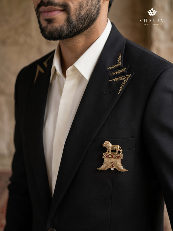 Gold-Tone Lion Crest Brooch with Red Accents, styled view