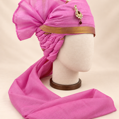 Right side view of magenta gold border premium barati safa showing the twisted folds and fan detail