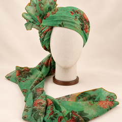 Front view of mint green rose floral print barati safa showing the patterned wrap and fan