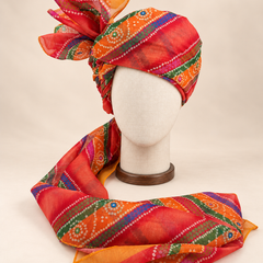 Front view of multicolour banded bandhani print barati safa showing the patterned wrap and fan
