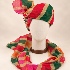 Front view of multicolour bold stripe barati safa showing the patterned wrap and fan