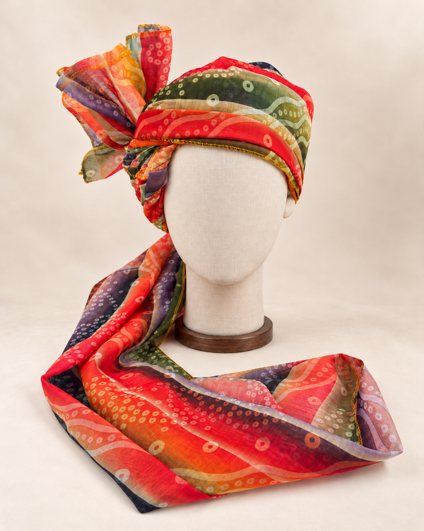 Front view of multicolour circle stripe print barati safa showing the patterned wrap and fan