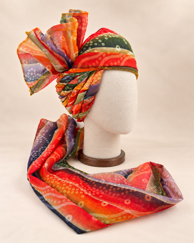 Right side view of multicolour circle stripe print barati safa showing twisted folds and fan detail
