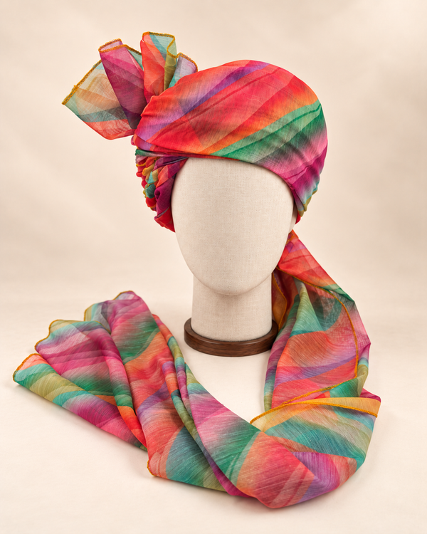 Front view of multicolour leheriya Barati Safa with coral magenta green teal and mustard stripes