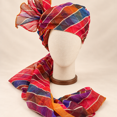 Front view of multicolour leheriya stripe barati safa showing the patterned wrap and fan