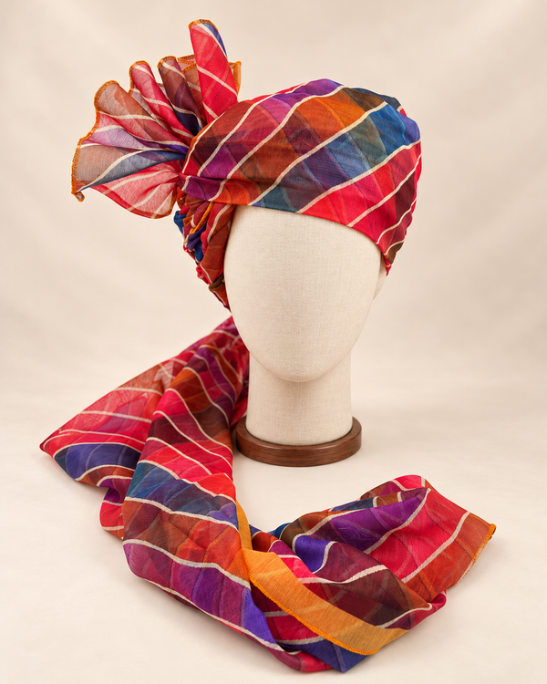Front view of multicolour leheriya stripe barati safa showing the patterned wrap and fan