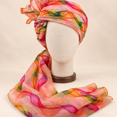 Front view of multicolour wave print barati safa showing the patterned wrap and fan