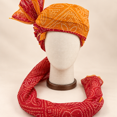 Front view of mustard rust bandhani print Barati Safa showing the mustard crown and rust red patterned tail